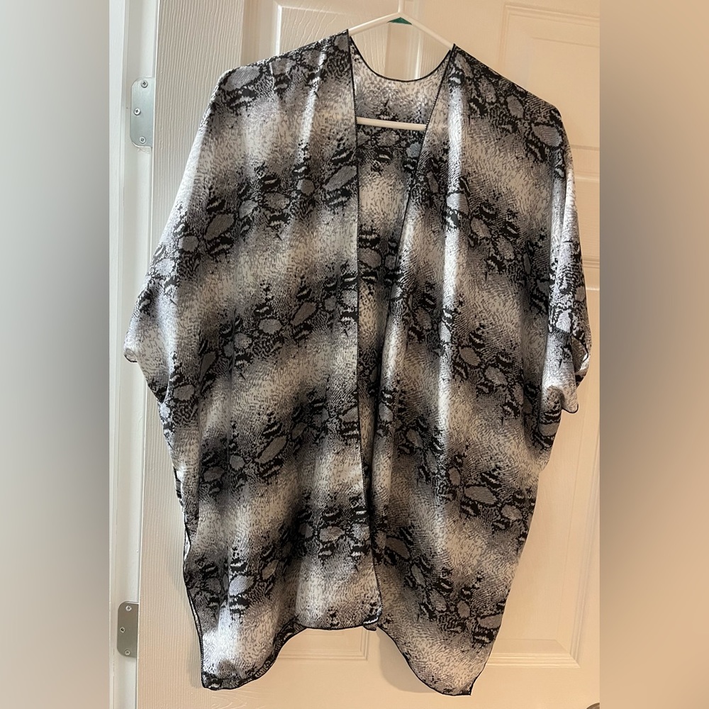 ***😀3 for $35./Beautiful black & white snake skin print over lay.